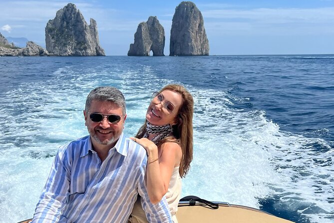 All-Inclusive Capri Boat Tour with City Visit from Positano - Getting on board at Spiaggia di Positano Marina Grande