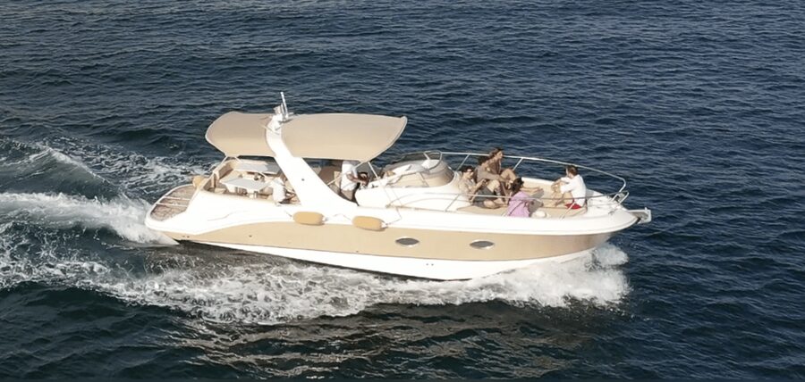 Amalfi Coast: Romantic Sunset Cruise with Music & Cocktails - Free-flow drinks and local snacks, with a real bar setup