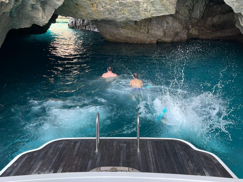 Amalfi Coast: Scenic Boat Private Tour with Aperitif - Stop for swimming and snorkeling in clear Mediterranean water
