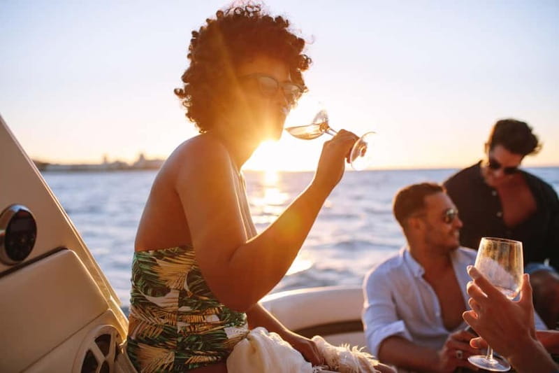 Amalfi Coast Shared Sunset Cruise: Swim, Drinks & Views - Sailing the Amalfi Coast, Built Around Arches, Caves, and Coastal Towns