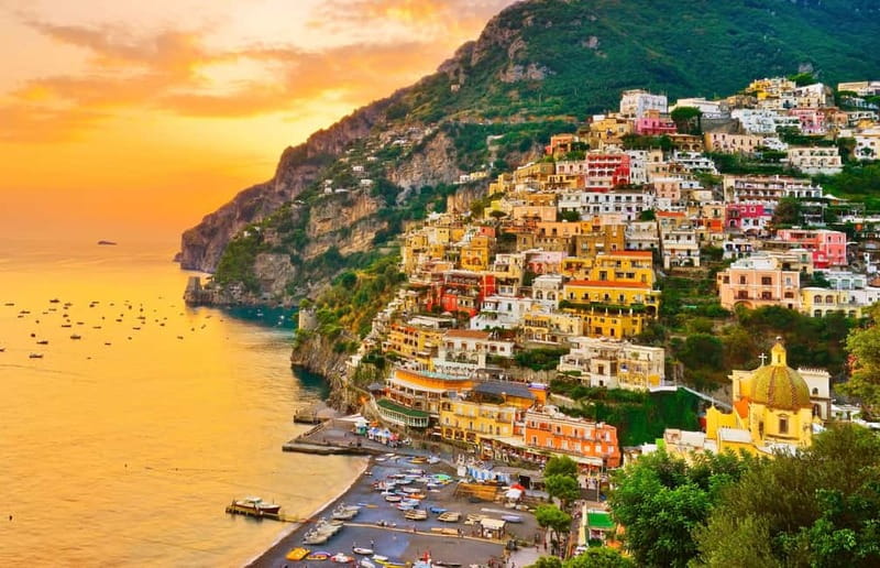 Amalfi: Sunset Boat Tour with Fruit and Drinks - Amalfi to Praiano: Saint Andrew Grotto, Arc of Lovers, and the coast’s best side