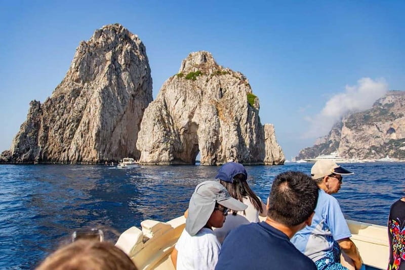 Boat Tour to Capri with Lunch on Board, Swimming and Fun - Getting picked up in Sorrento, then sailing out to Capri