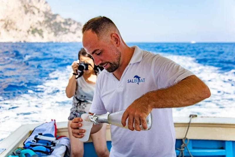 Boat Tour to Capri with Lunch on Board, Swimming and Fun - Grotta Bianca, the Faraglioni views, and why the boat angle is special