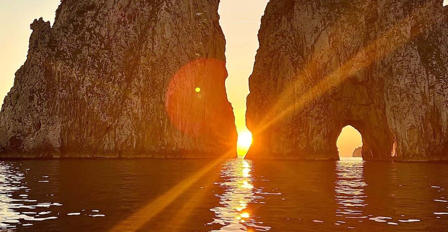 Capri: 2-hour boat tour of the caves and stacks - Capri Gozzo Comfort: Cushions, Drinks, Towels, and Bluetooth