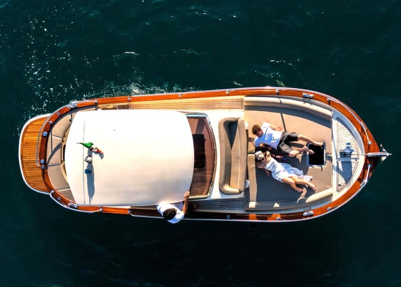 Capri : 2 Hours Private Boat from Capri - The opening loop: Lo Scoglio Delle Sirene and the Song of the Sea