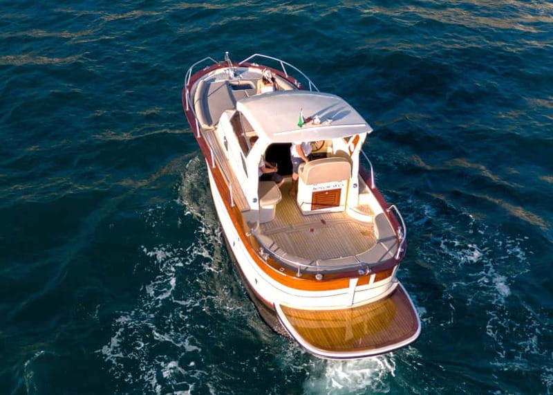 Capri : 2 Hours Private Boat from Capri - Capri by boat: Faraglioni rocks, quick photos, and a guided moment