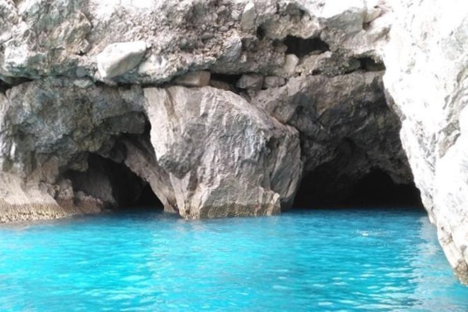 Capri Boat Tour from Sorrento: Swim, Grottos & Light Lunch - Faraglioni, Villa Malaparte, and Punta Carena: Postcards From Sea Level