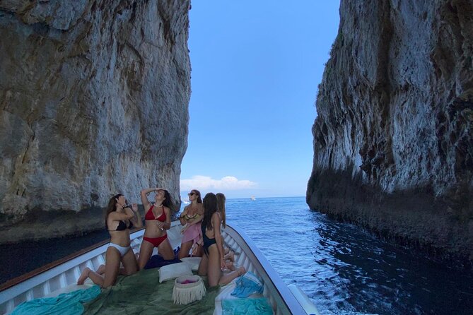 Capri Boat Tour: Grottoes, Swim & Sip Limoncello in a Small Group - Grottos in the Dark With Daylight: What to Expect at Each Cave Stop