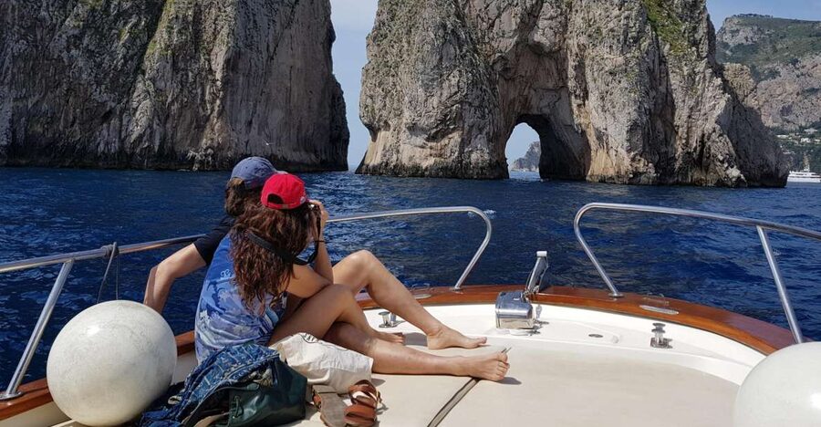 Capri by Boat from Massa Lubrense - The route out of Massa Lubrense: Mariciano waterfall, Mitigliano bay, Punta Campanella