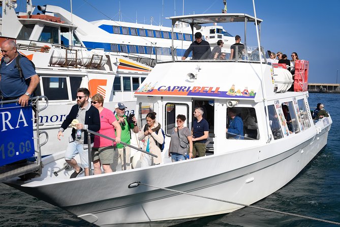 Capri Coast to Coast: Boat Tour with Optional Blue Grotto - Natural Arch, Villa Malaparte, Punta Carena, and Faraglioni From Close Range