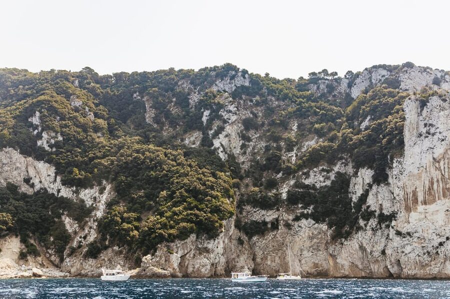 Capri: Island Boat Tour and Optional Blue Grotto Visit - The grotto entry: rowboat transfer and the express setup