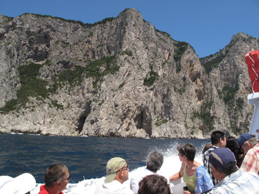 Capri: Private Island Boat Tour with Snorkeling and Swimming - The real Capri magic: sailing past Faraglioni Rocks and the Natural Arch