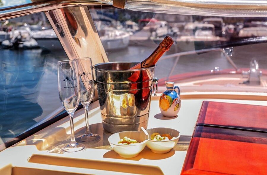 Discover Capri's Hidden Gems: Group Tour Boat Experience - Swim and snorkel time: using the crystal-water stops the smart way