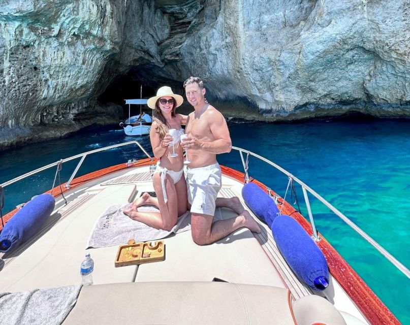 from Amalfi: Capri Boat Tour with Blue Grotto - Faraglioni, Arco Naturale, and the White Grotto: photo stops done right