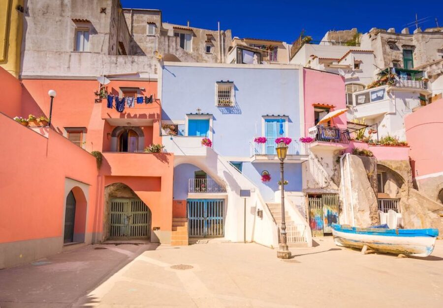 From Ischia: Procida Island Guided Cruise - Pozzo Vecchio beach: swim in volcanic sand and movie-setting water