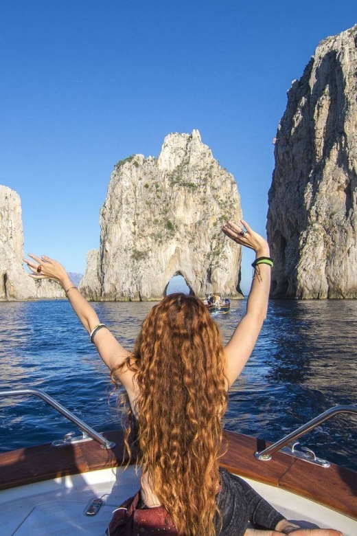 From Positano: Full-Day Boat Trip to Capri - Sorrento coast scenery: Marina Grande, Roman ruins, and waterfall views