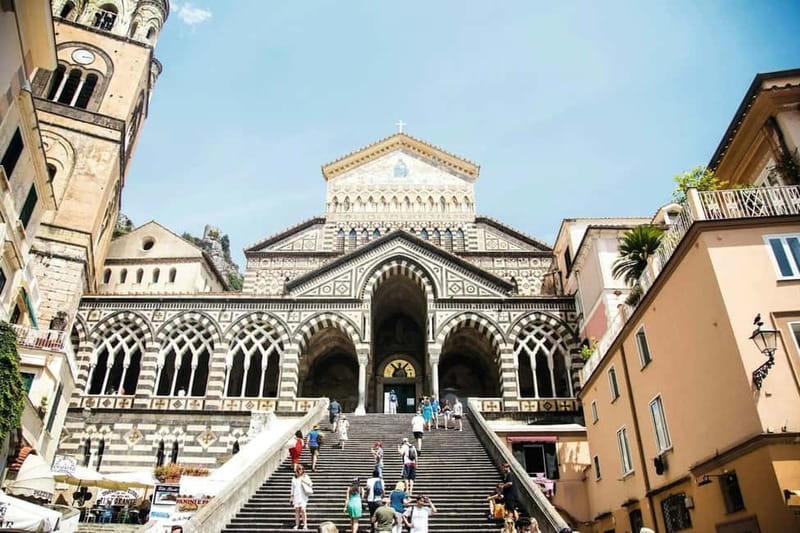 From Sorrento: Amalfi Coast Guided Bus Tour and Ferry Ride - The guided walking tour in Amalfi, what you gain beyond wandering