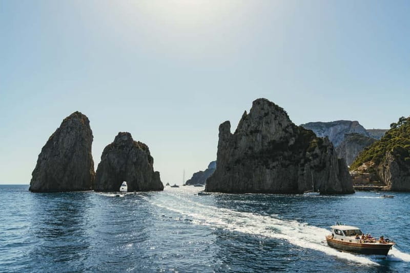 From Sorrento: Capri Boat Cruise with Swimming and Prosecco - What Happens on Board: Prosecco, Masks, and a Small-Group Feel