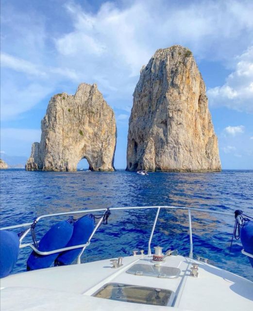 From Sorrento: Capri Boat Trip with City Visit & Swim Stops - Green Grotto plus the Punta Carena lighthouse views