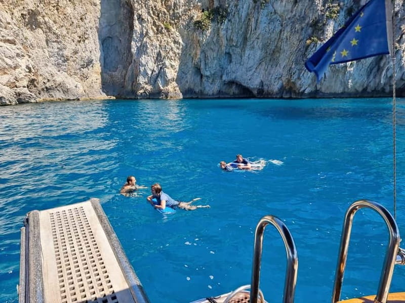 From Sorrento: Capri Small Group Boat Day Tour - Faraglioni rocks from the water, where Capri photos actually happen