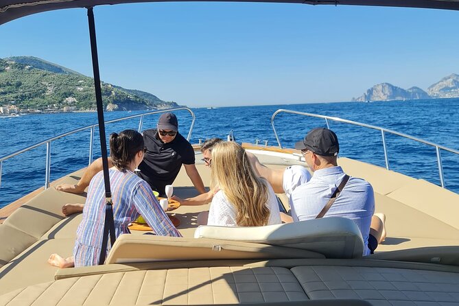 From Sorrento: Capri Small-Group Boat Tour with 4 Hours ashore - Green Grotta: dolomite, cave light, and a great sea-side photo moment