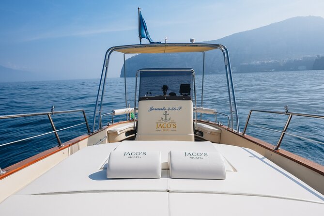 Full-Day Private Capri Boat Tour - Onboard comfort: WiFi, a restroom, and the drink-and-snack setup