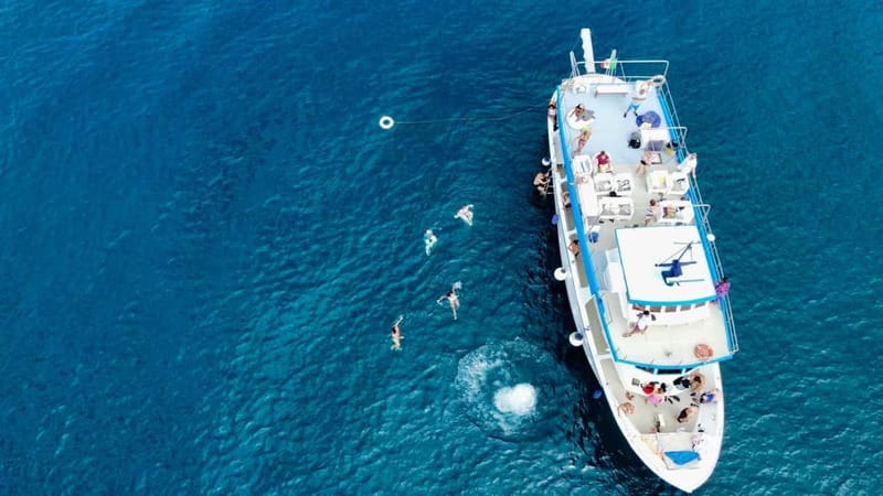 Ischia: Boat tour with swimming stops and lunch on board - Maronti and Scarrupata: coast passes that build anticipation