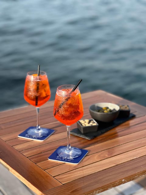 Italian aperitif at the sunset by the sea - What the sunset actually feels like in this private bay