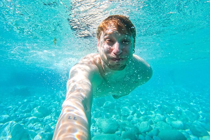 Kayak tour in Capri between caves and beaches. Photos included. - Price and What $52.99 Buys You in Real Value