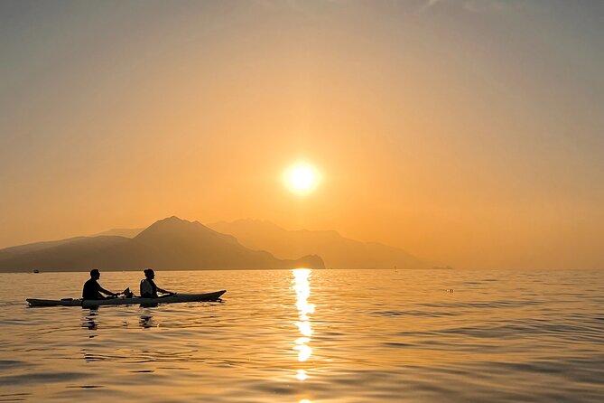Kayak tour in Capri between caves and beaches. Photos included. - Arco della Stella: The Arch You Paddle Through