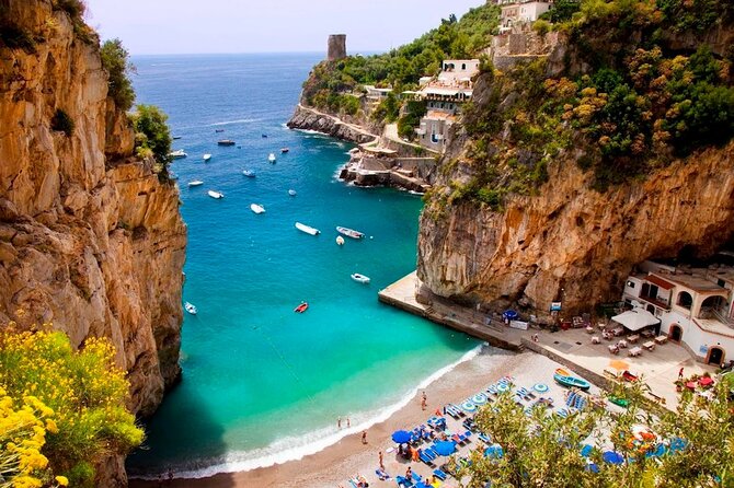 Positano & Amalfi Boat Tour from Sorrento: Swim & Light Lunch - Sorrento coast preview: Marina Grande, Roman ruins, and waterfall views