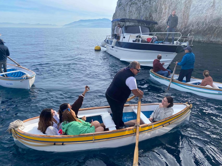 Positano: Capri and Blue Grotto Shared Boat Tour with Drinks - Cruising the perimeter of Capri: grottos, Faraglioni, and Punta Carena