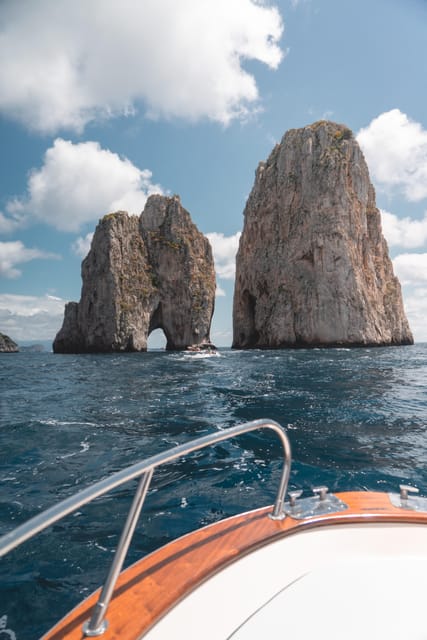 Positano: Capri and Blue Grotto Shared Boat Tour with Drinks - Swim stop and snorkeling masks: the downtime that actually pays off