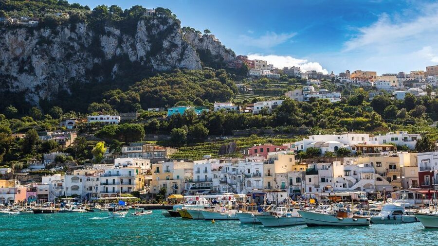 Sorrento: Capri and Blue Grotto Boat Cruise with Drinks - Capri by Boat: Faraglioni, Caves, Natural Arch, and Punta Carena