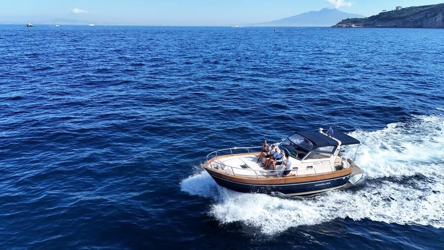 Sorrento: Capri and Blue Grotto Yacht Tour with Snorkeling - Faraglioni, Marina Piccola, Punta Carena, and Arco Naturale