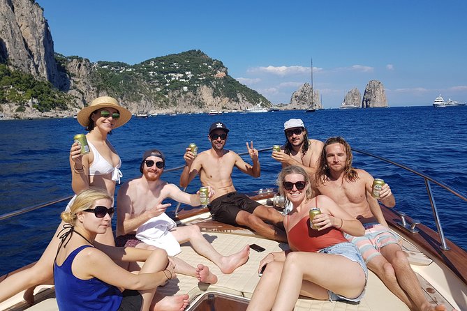 Sorrento: Capri Select Boat Trip with Swim, Drinks & Pick Up - Drinks, Chips, and the Onboard Comfort Reality Check