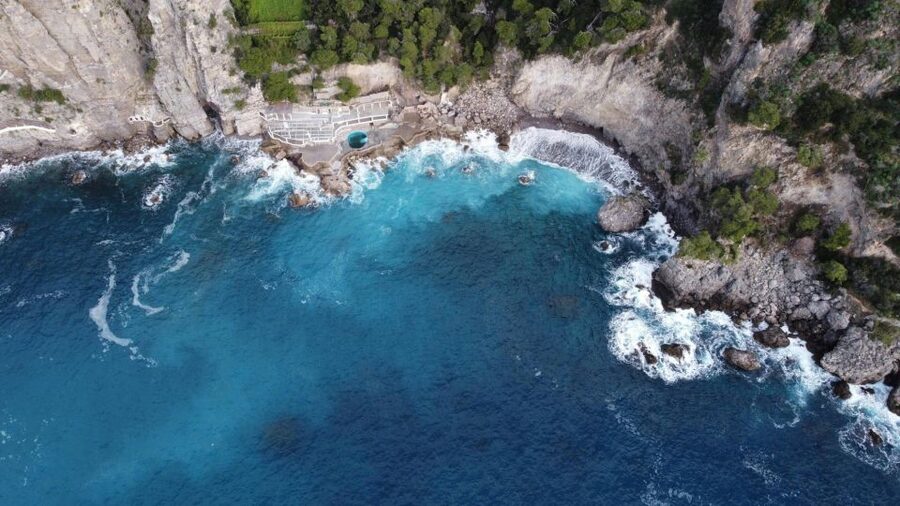 Tour in Barca da Amalfi un Viaggio da Sogno in Amalfi Coast - Conca dei Marini to Santa Rosa Monastery: villas, a hotel on La Vite beach, and local pastry lore